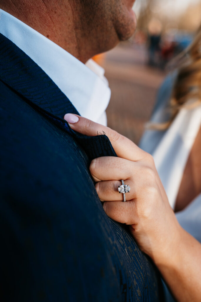 ring photo of couple in St. Anthony Main, Minneapolis. 