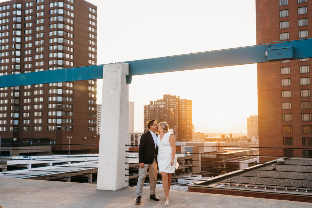 photo of couple standing on a parking ramp near St. Anthony Main, Minneapolis. 