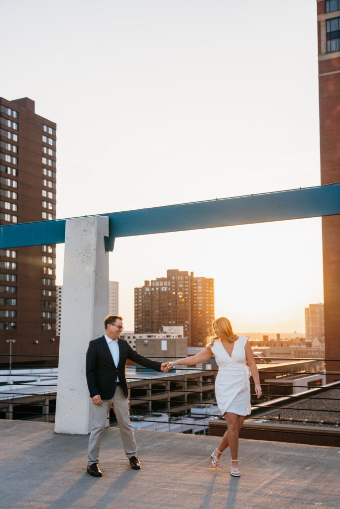 photo of couple walking on a parking ramp near St. Anthony Main, Minneapolis. 